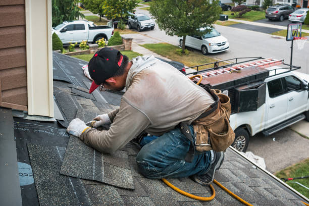 Professional Flat Roof Repair technician working in Boston, IN